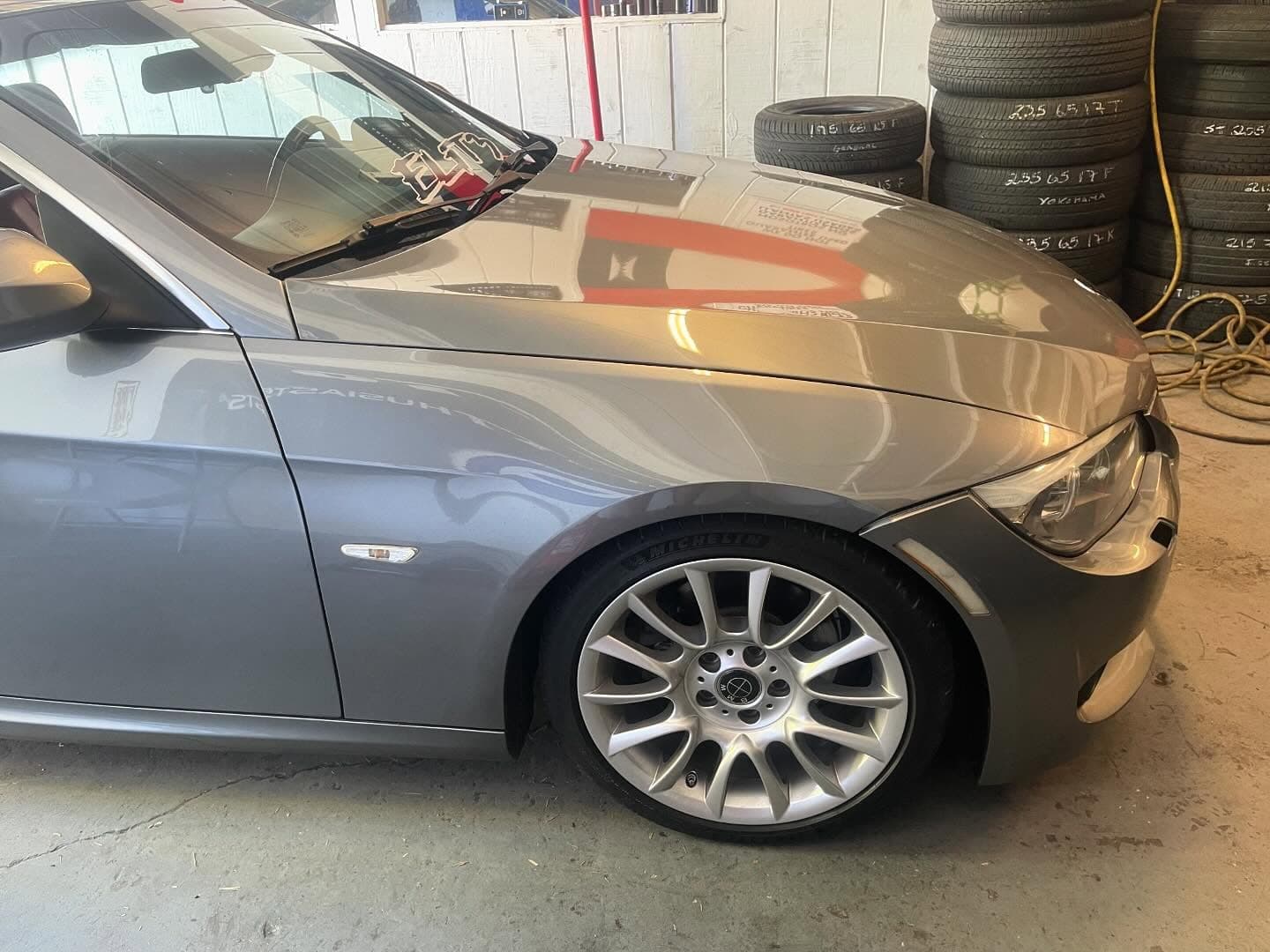 BMW 3 Series getting tire service at 4Ever Tires
