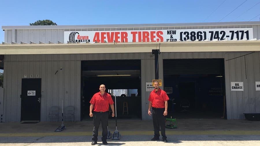 4Ever Tires team standing in front of the Longwood FL shop